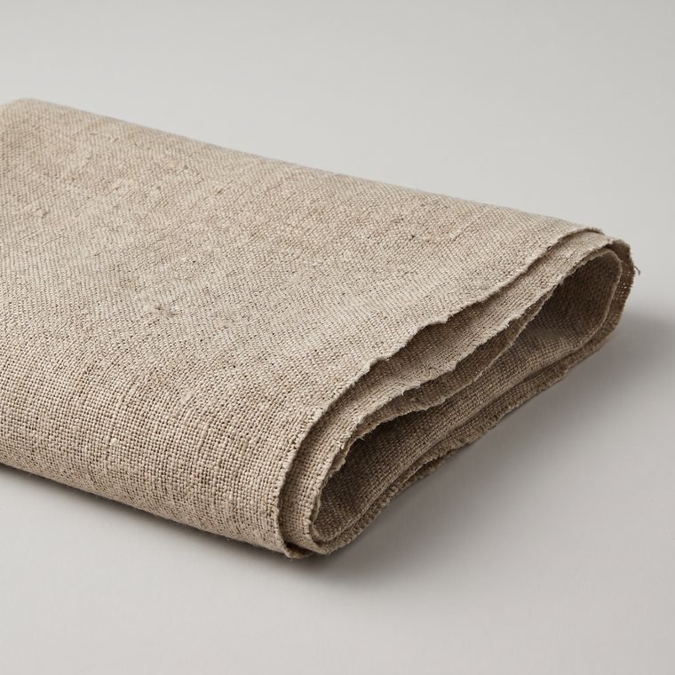 A folded length of natural jute-linen cloth